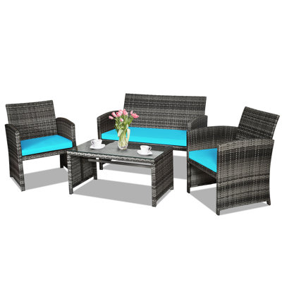 Akshath 4pcs Patio Rattan Furniture Conversation Set With Glass Table Top And Cushions