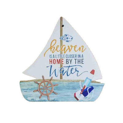 Plaque murale en forme de voilier
