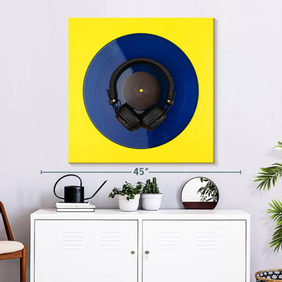 Abarca Headphones On Vinyl Record