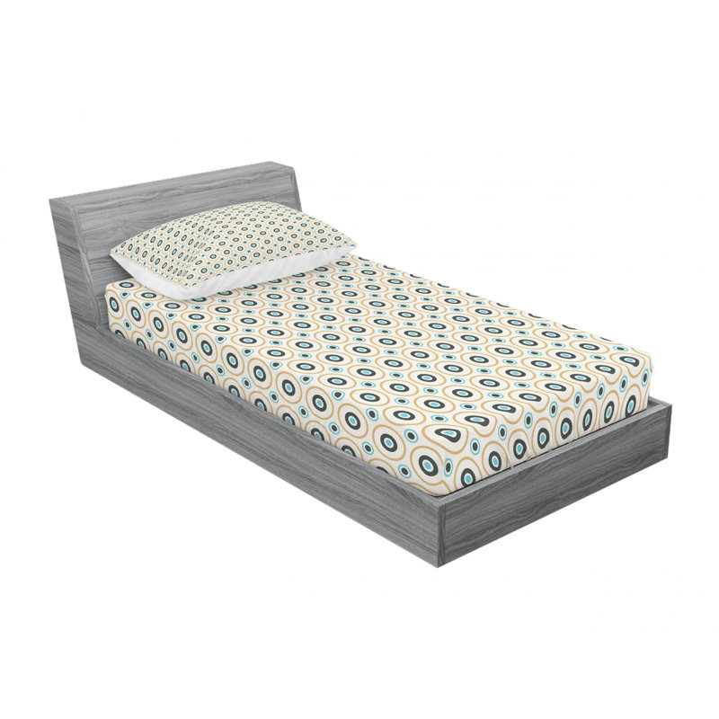 Ensemble de draps géométriques à motif de cercles et de pois de différentes tailles
