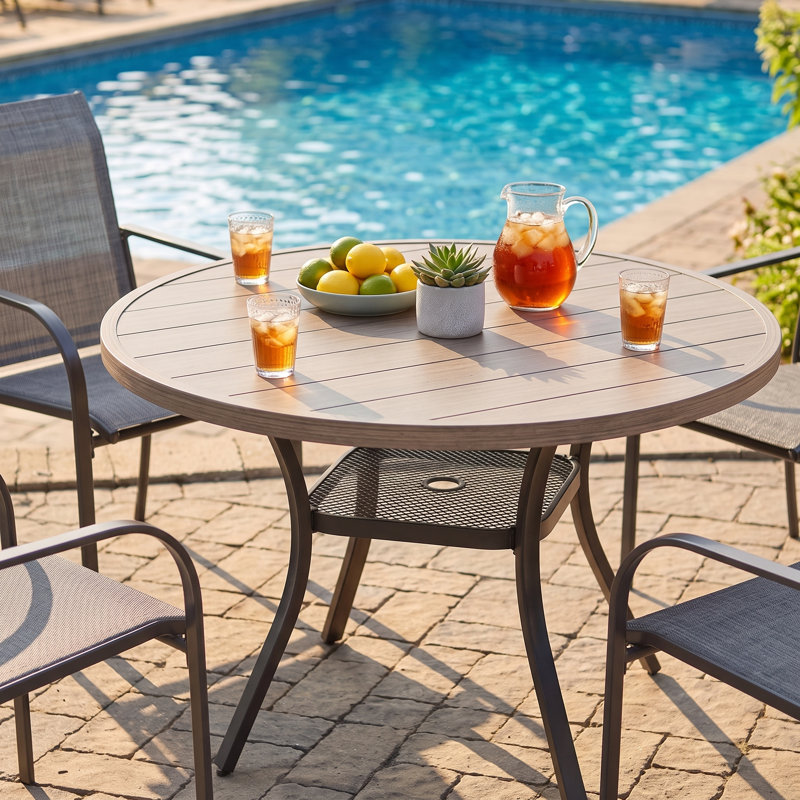 Round 4 - Person Outdoor Dining Set with 4 Stackable PVC-coated polyester Armrest Chairs, Brush Wood Gray/Gray