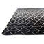 Tapis noir Kalmanovitz