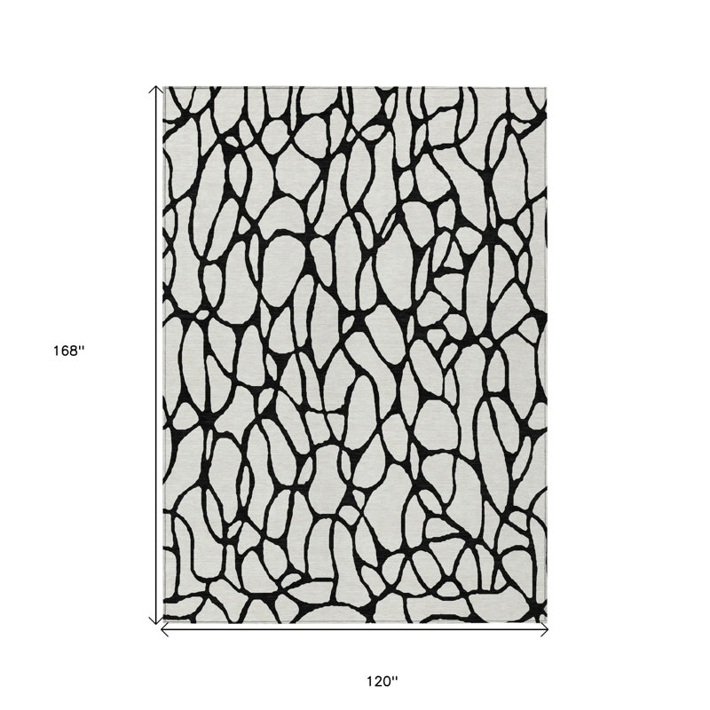 Tapis extérieur lavable à motif géométrique ivoire et noir 10 pi x 14 pi