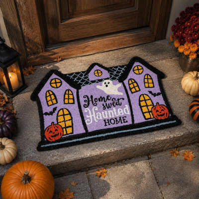 Décoration d'Halloween : Paillasson irrégulier avec motif de maison hantée, idéal pour le porche et la maison.