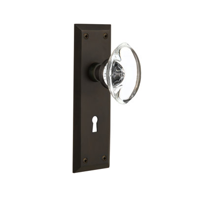 Bouton de porte de mortaise intérieure ovale en cristal avec plaque longue New York