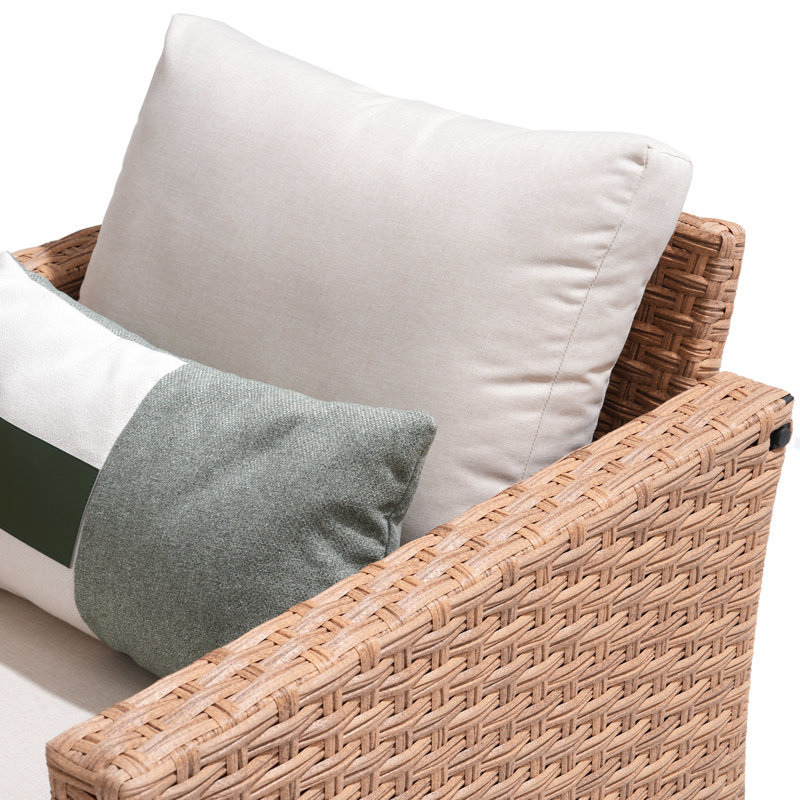 Chaise d'extérieur pivotante en rotin avec coussins