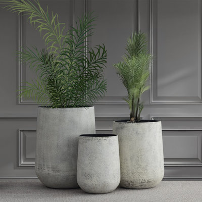 Ensemble de 3 jardinières en fer gris antique