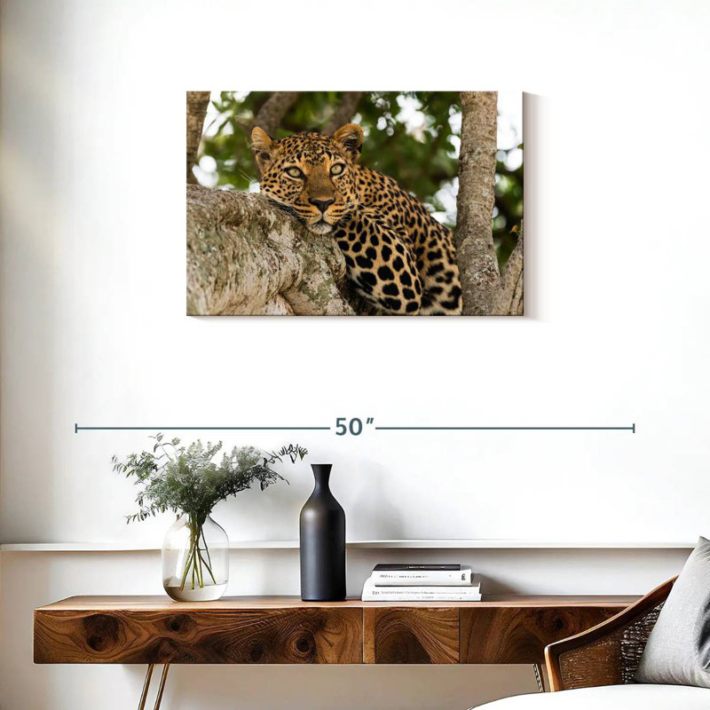Brampt Leopard On Tree Trunk