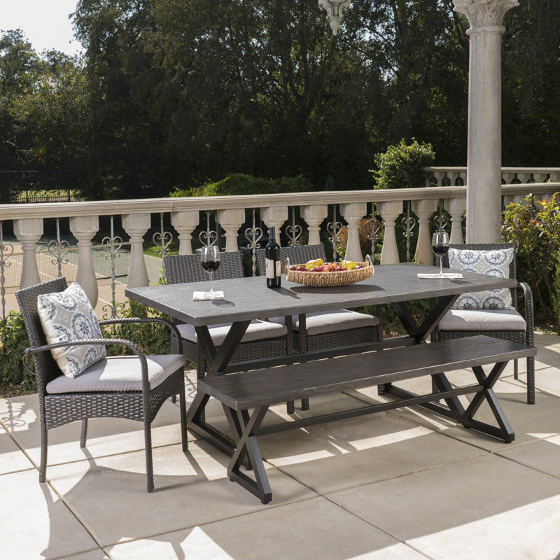 Olcott 6 - Person Wicker Patio Dining Set with Rectangular Table , Cushions Included, Gray