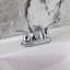 Robinet de salle de bain central à 4 poignées à 4 trous à fixation sur le comptoir avec robinet escamotable en plastique Kingston Brass Yosemite-13612059