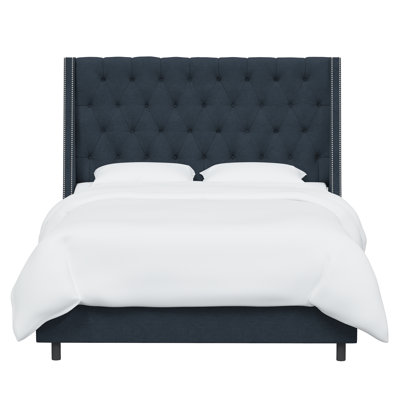 Avala Upholstered Wingback Bed