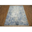 Tapis moderne et artistique avec des tons de bleu et de gris doux 5 x 8