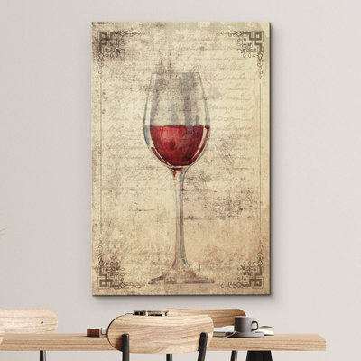 Un verre de vin rouge sur fond de lettre rétro