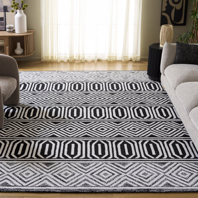 Tapis ivoire / noir Capri 702