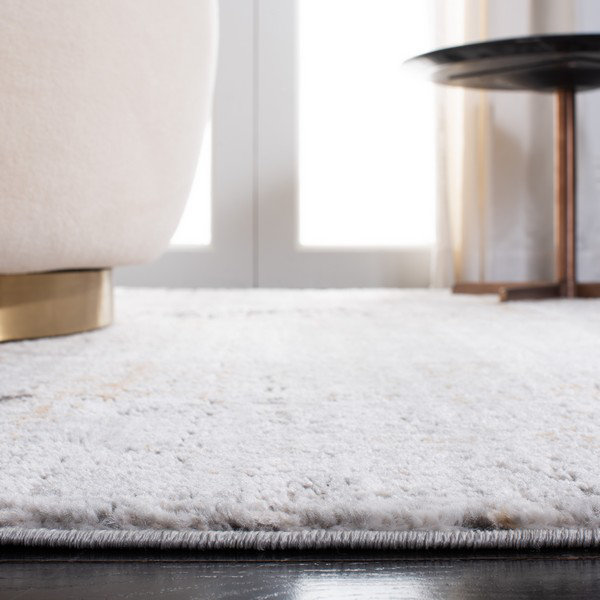 Looped/Hooked Grey Rug