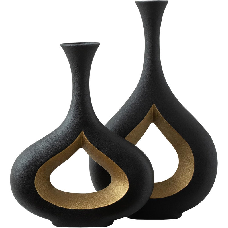 2 pièces de vases à beignes noirs et dorés 