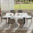 Table noire avec chaises grises est en rupture de stock