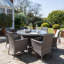 Dubose 4 - Person Wicker Patio Dining Set with Round Table , Cushions Included-969686495