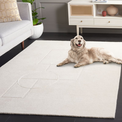 Tapis géométrique beige / ivoire en laine / viscose touffeté à la main Calyssa