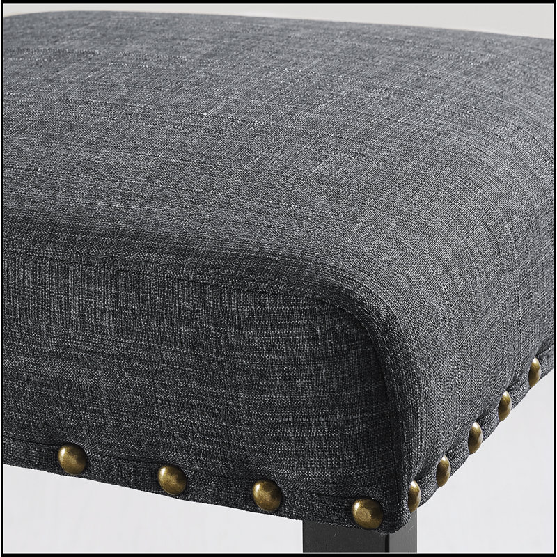 Tabourets à hauteur de comptoir en tissu Biony avec garniture cloutée, ensemble de 2, pour des sièges élégants et confortables dans les cuisines et les salles à manger modernes.