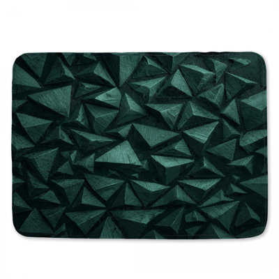 Tapis de bain vert à motif de pyramides géométriques
