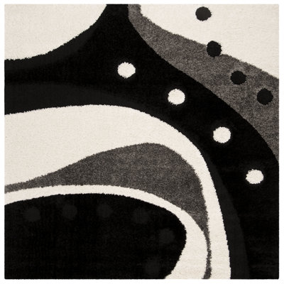 Ashal Abstract Black/Ivory Area Rug