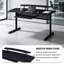 Bureau d'ordinateur noir avec plateau pour clavier, support pour écran et crochets pour casques