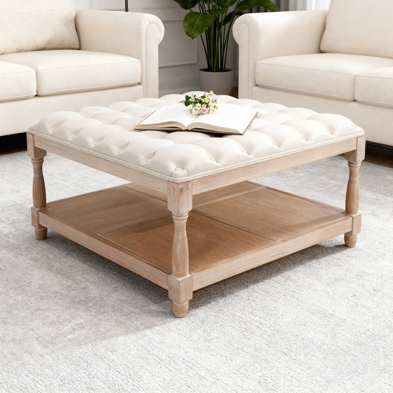 Grande table basse carrée avec repose-pieds capitonné avec tablette de rangement