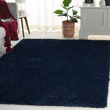 Brelee Solid Color Machine Woven Polyester Area Rug in Navy