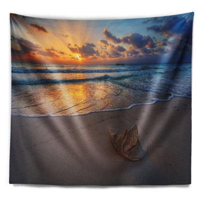 Tapisserie côtière tranquille au coucher du soleil
