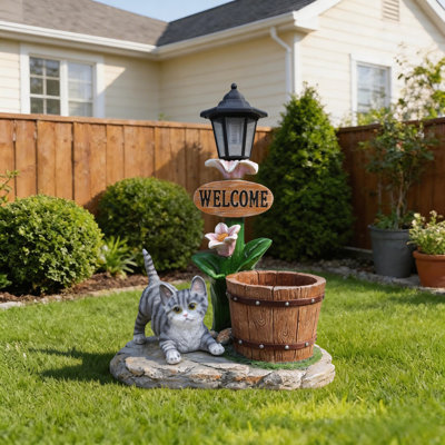 Décoration de jardin jardinière chat allongé