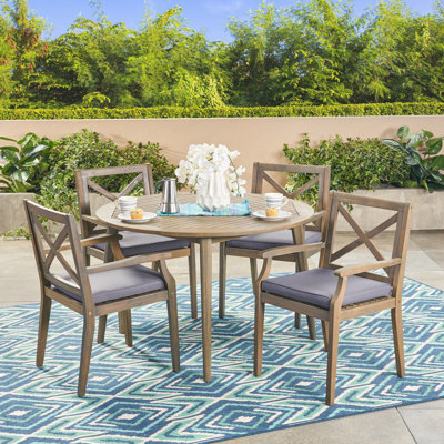 Hagues 4 - Person Acacia Wood Patio Dining Set with Round Table