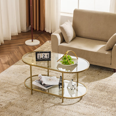 Oval Matte Gold Iron Frame Paired with Transparent Glass Double-layer Coffee Table