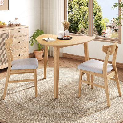 Modern Triangular Table Set with Curved Chairs