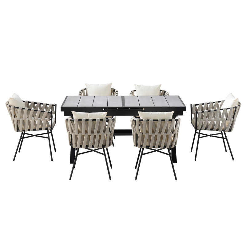 Discover Unmatched Flexibility In Alfresco Dining With Six Creatively Arranged Chairs Made Of Polyester Woven Tape And A Table That Expands From 62.9 To 82.6 Inches To Suit Any Occasion.