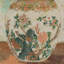 Décoration murale encadrée en bois avec fleurs dans un vase