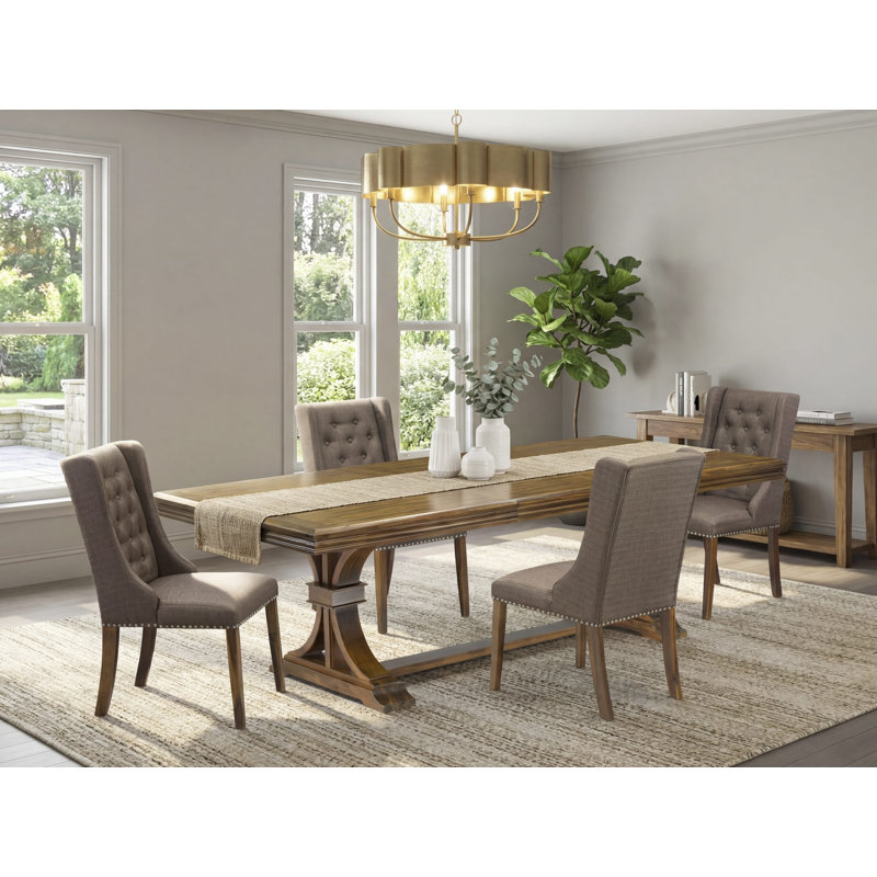 Cet ensemble de salle à manger 5 pièces comprend une table en bois et 4 chaises de cuisine en tissu de lin brun avec dossier capitonné - finition noyer antique.