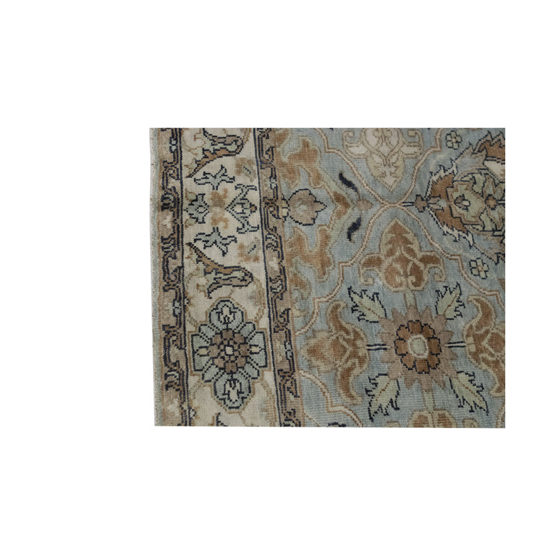 Tapis bleu et ivoire de haute qualité noué à la main