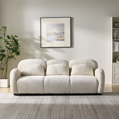 Canapé moderne 3 places 198 cm (78 po) en tissu bouclé beige, idéal pour un appartement, un bureau ou une chambre. Lignes douces, structure en bois, longueur généreuse, coussins haute densité inclus, siège confortable.