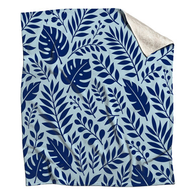 Couvertures bleues à feuilles botaniques