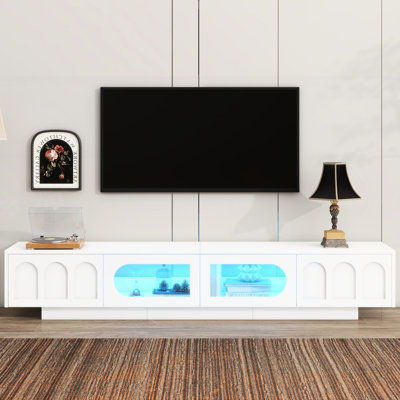 Meuble télé blanc pour les grandes téléviseurs de 95 po ou moins, avec portes d'armoire arquées et éclairage à DEL intelligent, console média fonctionnelle pour téléviseurs de 95 po, bande, salon spacieux