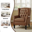Fauteuil à oreilles capitonné avec accoudoirs roulés et coussin épais Duward-1679103790