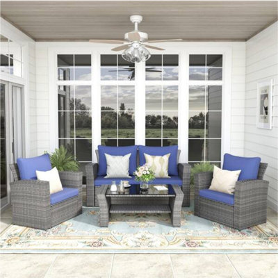 4-Piece Wicker Patio Conversation Set With Glass Table And Blue Cushions