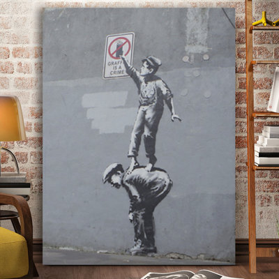 "graffiti is a crime" par banky, impression sur toile tendue