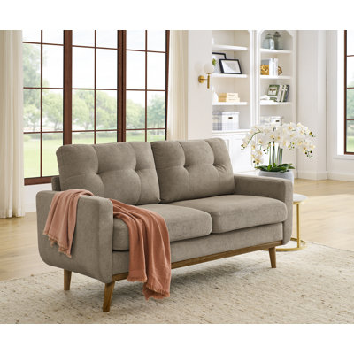 Canapé capitonné de style Mid-Century moderne avec pieds en bois, d'une largeur de 67,7 pouces pour un confort élégant et un design intemporel.