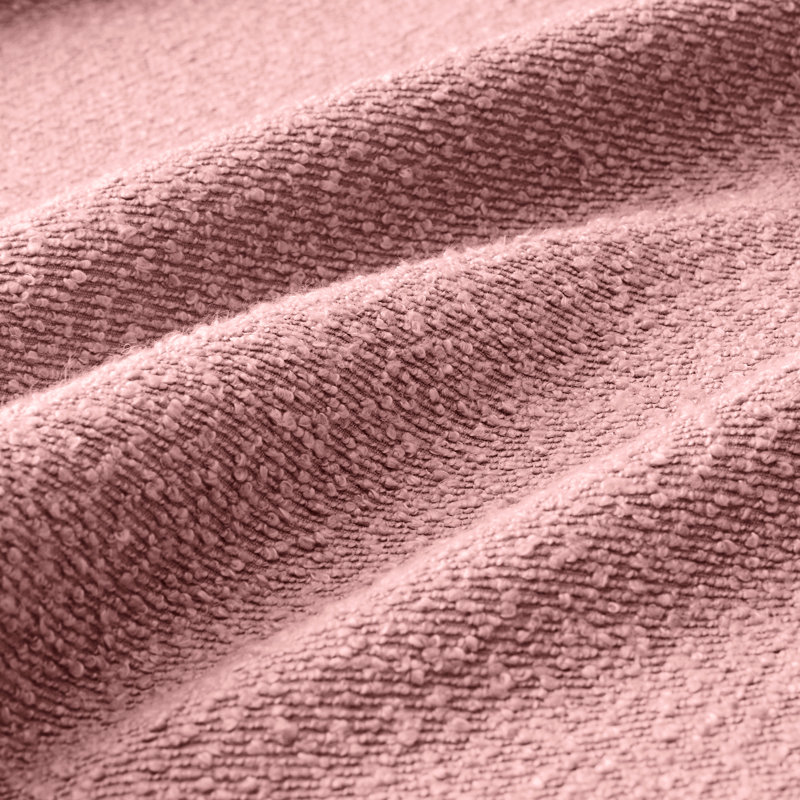 Canapé rose à 4 places en tissu bouclé avec construction et configuration de siège souple pour une utilisation régulière