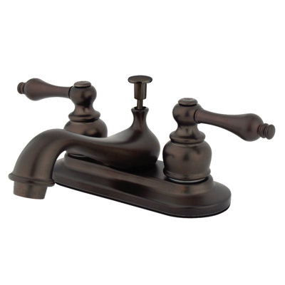 Kingston Brass Restoration Two-Handle 3-Hole Deck Mount 4" Centerset Bathroom Faucet with Plastic Pop-Up