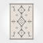 Tapis à motif géométrique marocain beige Thambiah-1950429731