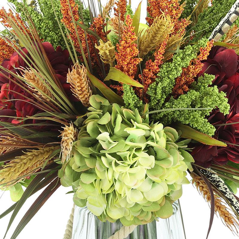 Hydrangeas And Heather Arrangement In Vase