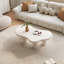 Table basse irrégulière blanc crème avec 4 pieds